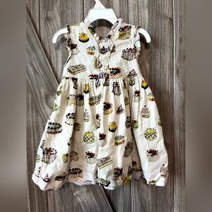 Pink Chicken Jennifer dress in the "Birthday Star" or "Birthday Cake" print, fea